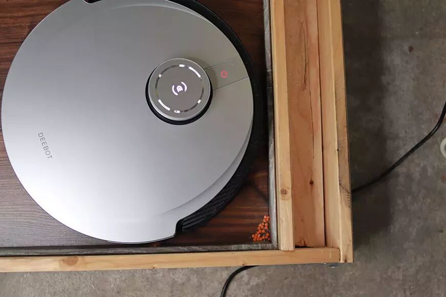 The Ecovacs Deebot X1 OMNI cleans a corner